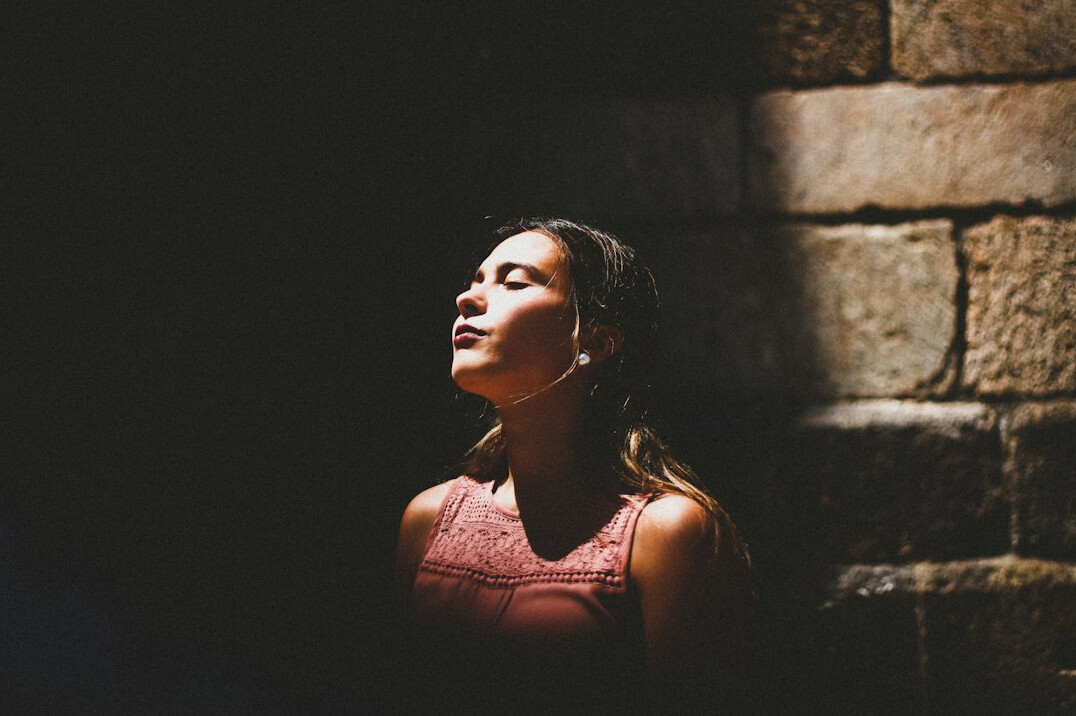 person doing breathing exercise